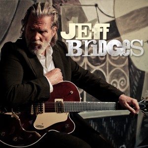 Le musicien Jeff Bridges avec sa guitare